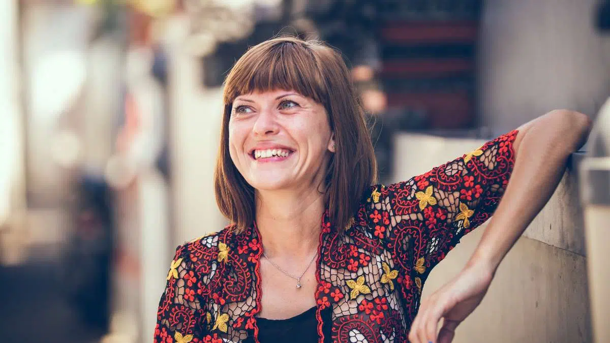Steer clear of patterns and prints Woman wearing a very busy patterned top