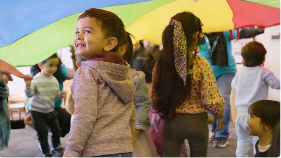 Convert more prospects with marketing video production 1 Children playng in playgroup