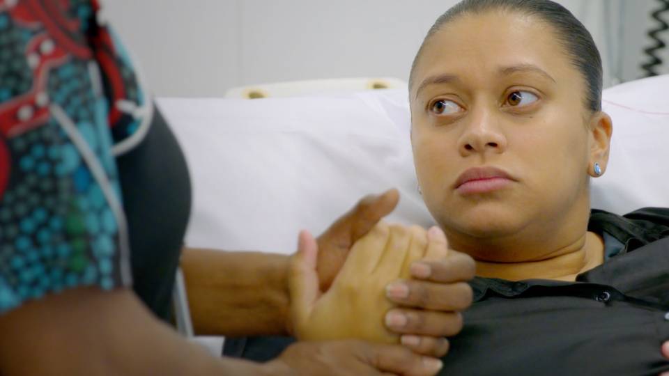 Contact 4 Scene from video production of a woman in hospital bed