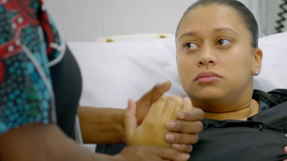 Contact 4 Scene from video production of a woman in hospital bed