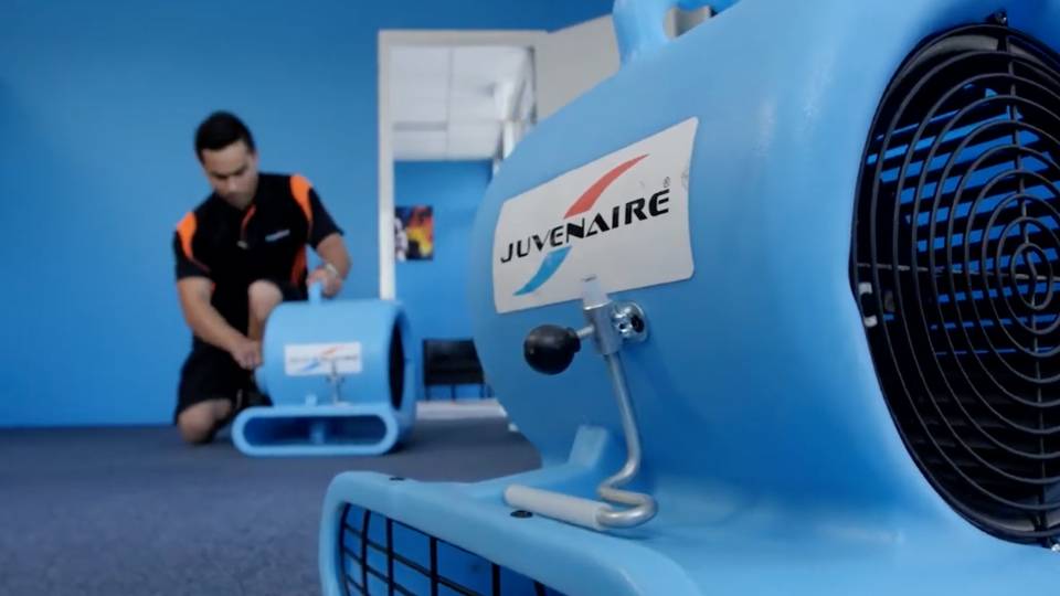 Client testimonials 31 Scene from juvenaire video production of technician setting up cleaning equipment